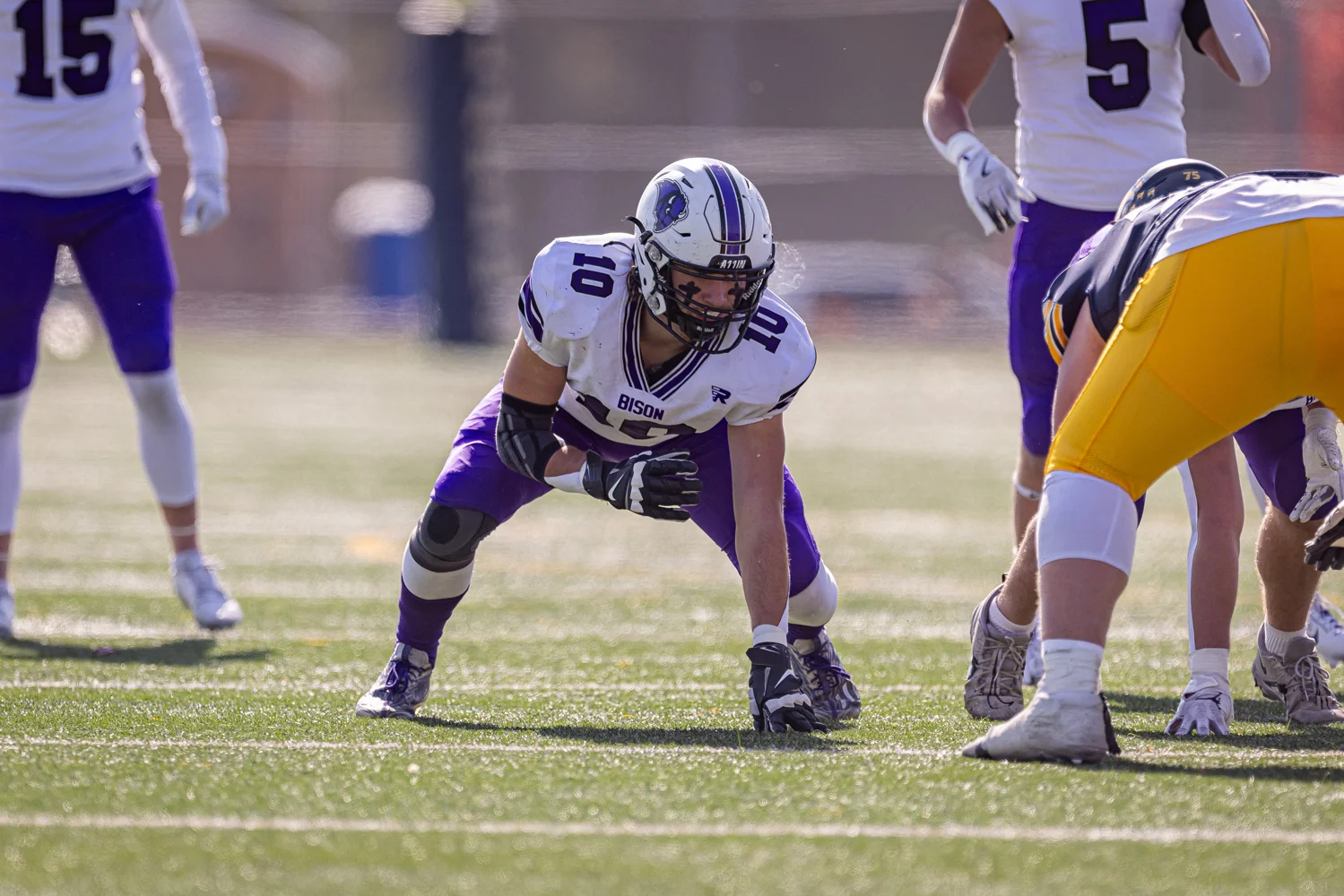 Defensive lineman ready for the snap of the ball